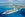 An aerial view of Royal Caribbean's Freedom of the Seas cruise ship docked along a pier in the Caribbean