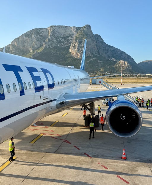 The race to Sicily begins as United's latest inaugural flight lands in Italy